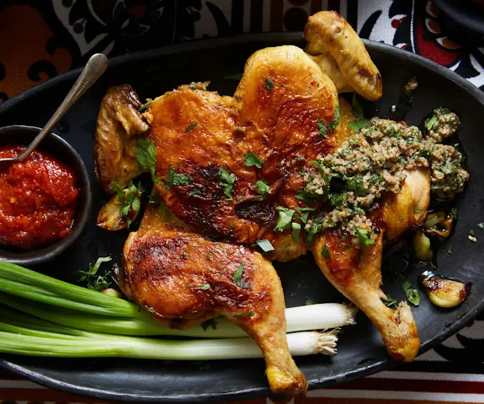 Tsyplyonok Tabaka (Pan-Fried Crispy Chickens With Walnut-Garlic Sauce) image