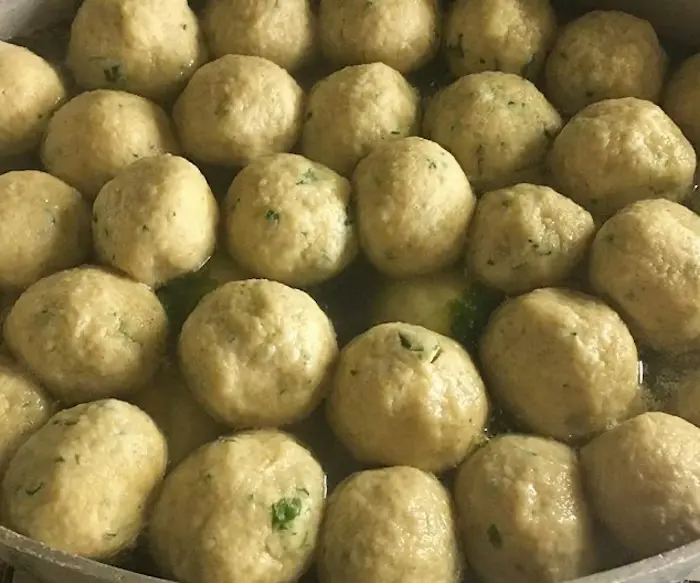 Cneidalaj (Matzo Ball Soup With Cumin and Parsley) image