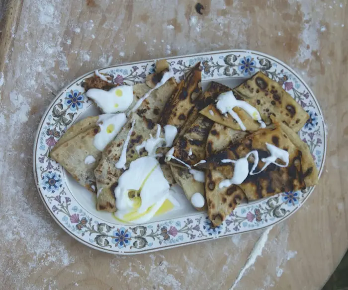 Fire-Cooked Pita Stuffed With Zaatar and Garlic image