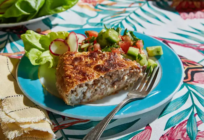 Pastel (Savory Pie Filled With Ground Meat, Rice, and Onions) image