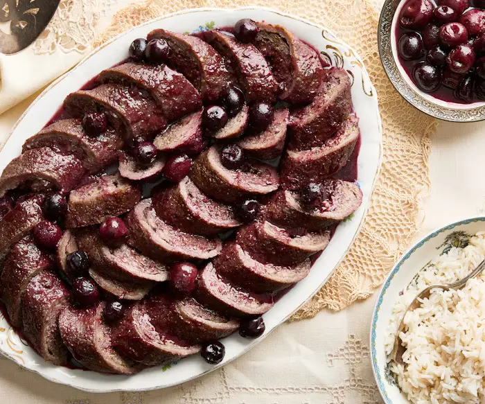 Kibbe Cherries (Syrian Meat and Rice Roll with Cherries and Tamarind) image
