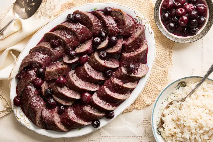 Kibbe Cherries (Syrian Meat and Rice Roll with Cherries and Tamarind) image