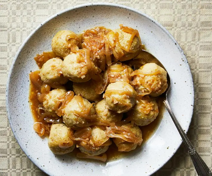 Kneidlach in Yassa Sauce image